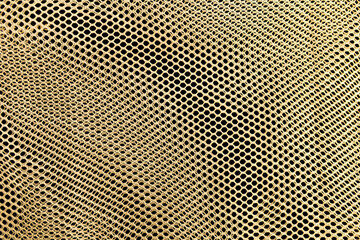 Yellow net on black fabric background, yellow net texture background
