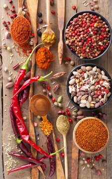 Spices on a wooden background