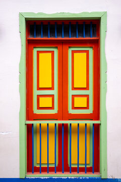 Traditional Colombian window full of colors closed