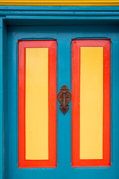 Colorful door with metal handle