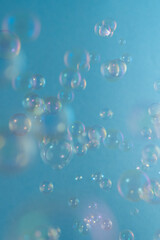 Soap bubbles on a blue background