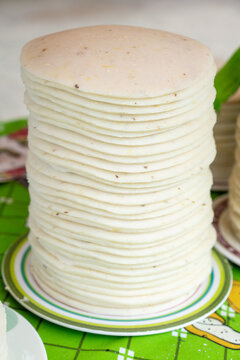Tasty white corn arepas on plate