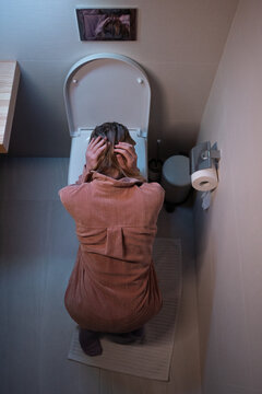 Vomiting woman