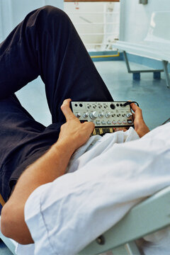 a man making music on a ferry