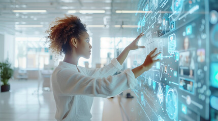 Digital contents concept. Social networking service. Streaming video. NFT. Non-fungible token. a woman touching a big floating screen with videos in a bright office