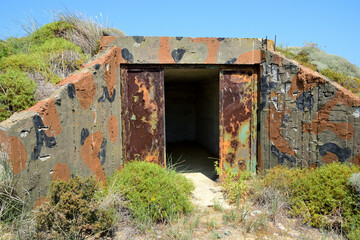 Fototapeta na wymiar the entrance to a concrete army bunker