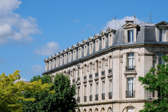 Parisian apartment building in summer