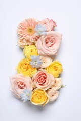 8 March greeting card design made with beautiful flowers on white background, top view