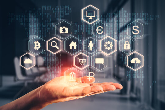 Close up of male hands holding creative hexagonal hologram on blurry office interior background. Business dashboard and digital interface concept.