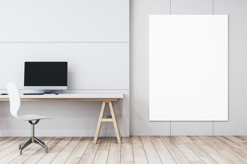 Modern minimalistic white interior with workplace and computer monitor, mock up banner on wall and wooden flooring. 3D Rendering.