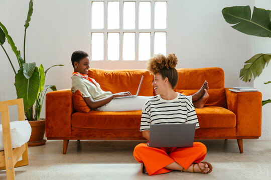 Female colleagues working on cozy office space