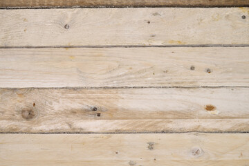 Obraz premium Rough wooden plank on table view from above