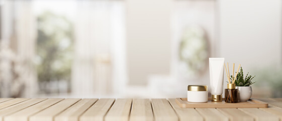A set of facial cream and a presentation space on a wooden desk in a modern white bathroom.