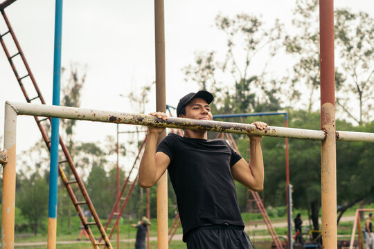 Man in sportswear exercising in the park.