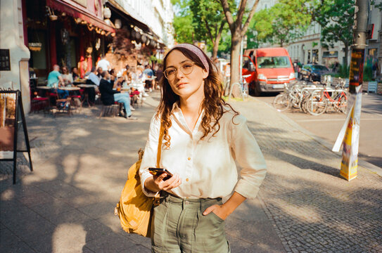 Woman exploring in the city in summer