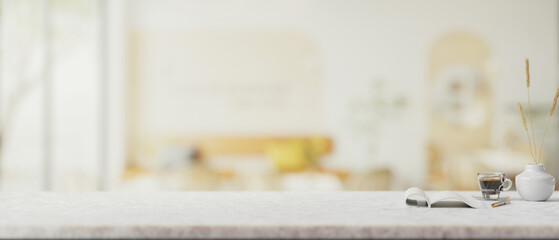 A presentation space for display product on a white marble table in a contemporary coffee shop.