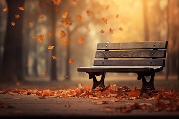 a bench with leaves falling in the air