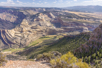Fototapeta na wymiar The meanders of the Green River cutting deeply in the landscape seen from Harper's Trail in the Dinosaur National Monument