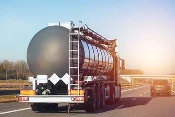 Foto op Aluminium Gas and fuel transportation truck on highway. It ships oil and lpg. © AlexGo