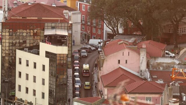 INEM ambulance in an emergency mission, 4k video view from above on streets of Lisbon city. Integrated Medical Emergency System also called INEM in Portugal.