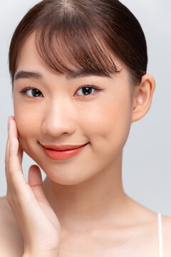 attractive asian woman skin care image on white background