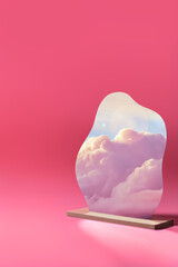 creative composition. mirror on pink background, clouds are reflected in the mirror at sunset