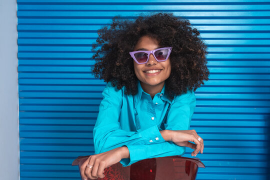 Vibrant Smile Against Cobalt Blue