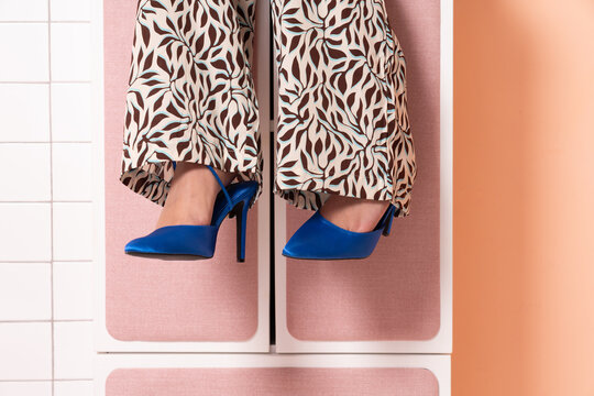 Chic Patterned Trousers with Blue Stiletto Heels