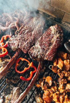 A couple of tomahaws in a BBQ
