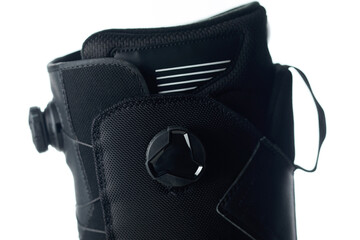 Close-up of the rapid lacing system of snowboard boots.