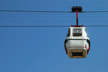 Cable car. Tourists are transported by cable car to get the aerial view of waterfall and marble...