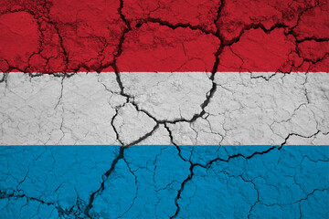 Close-Up of a Wrinkled and Cracked Old Grand Duchy of Luxembourg Flag