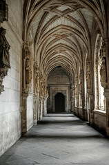 Fototapeta na wymiar Toledo Monastery of San Juan de los Reyes in the eighties. Hallway and arches.