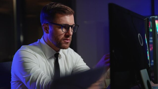 Cryptocurrency stock market trader investor analyst looking at computer monitor