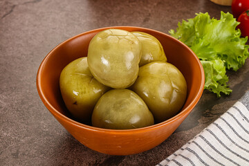 Homemade pickled green tomato appetizer