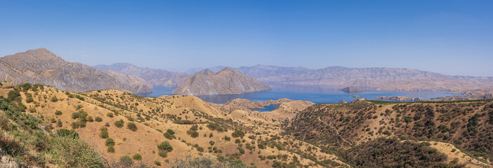 Colorful landscape panoramic view of Nurek dam lake second highest in world between Dushanbe and...