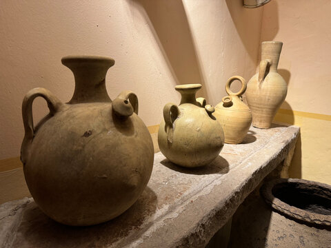 Four different clay jugs called botijo in spanish. A traditional mud jar used to keep fresh water inside.