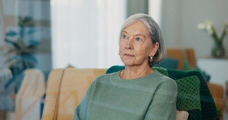 Thinking, face and senior woman on couch with dementia, memory loss and Alzheimer in nursing home. Old age, anxiety and elderly female with depression, reflection and lonely with grief or nostalgic