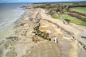 Atherington and Climping beach in West Sussex and the broken sea defence and the temporary shingle...