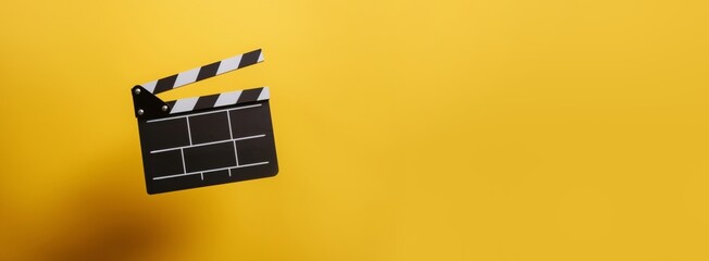 Clapperboard, movie slate, used in film production and cinema, movies industry isolated over bright yellow background - 751332053