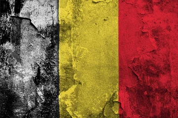 Fotobehang Kingdom of Belgium Flag Cracked Concrete Wall Textured Background © klenger