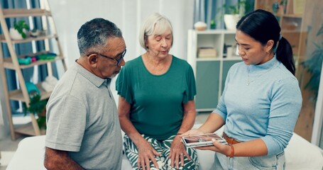 Senior, physiotherapy and couple with doctor and tablet for a consultation and retirement healthcare. Rehabilitation, patient and woman speaking to a physiotherapist with tech for medical advice