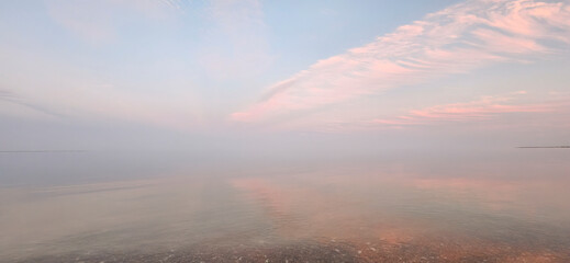 Fototapeta premium A scenic sunrise view of Indianola Beach in Port Lavaca, Texas.