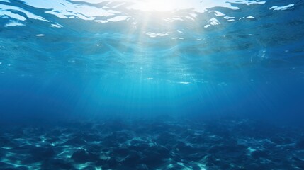 Fototapeta na wymiar Sun rays filtering through the blue underwater seascape