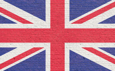 Fototapeta premium United Kingdom flag colors painted on a brick wall. National colors, country, banner, government, British culture, politics.