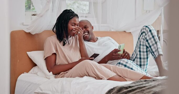 Couple, online and laughing on phone in bedroom for social media meme, internet joke and streaming in home. African man, woman and happy with smartphone for comic post, mobile app or relax in morning