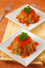 Eggplants with tomato sauce.