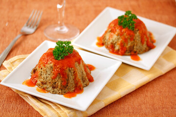 Eggplants with tomato sauce.