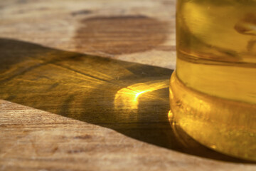 reflection through a bottle of olive oil