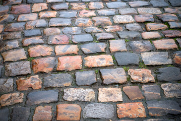 Closeup of ancient cobblestone texture in the street - 751352230